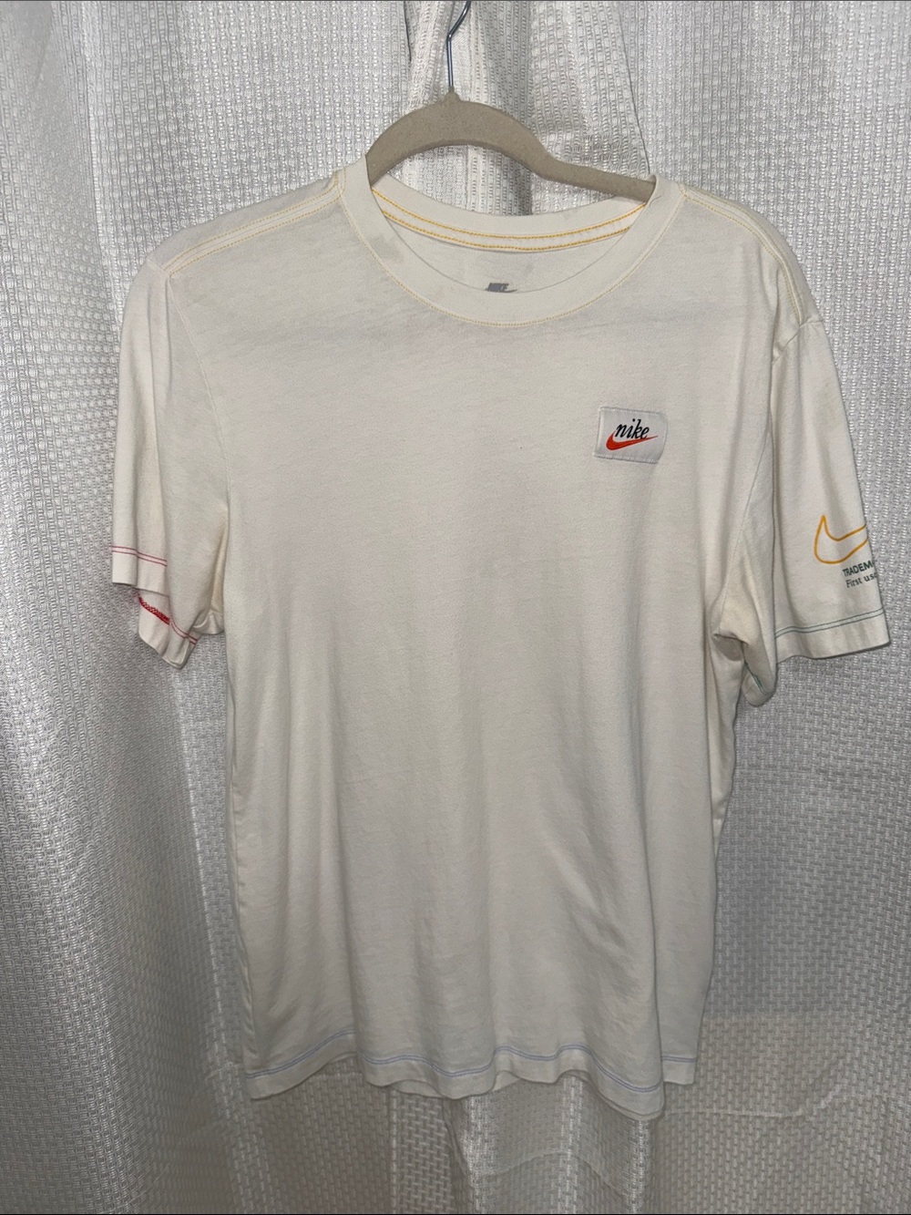 Nike Cream Short-Sleeve Tee with Subtle Stitch Accents